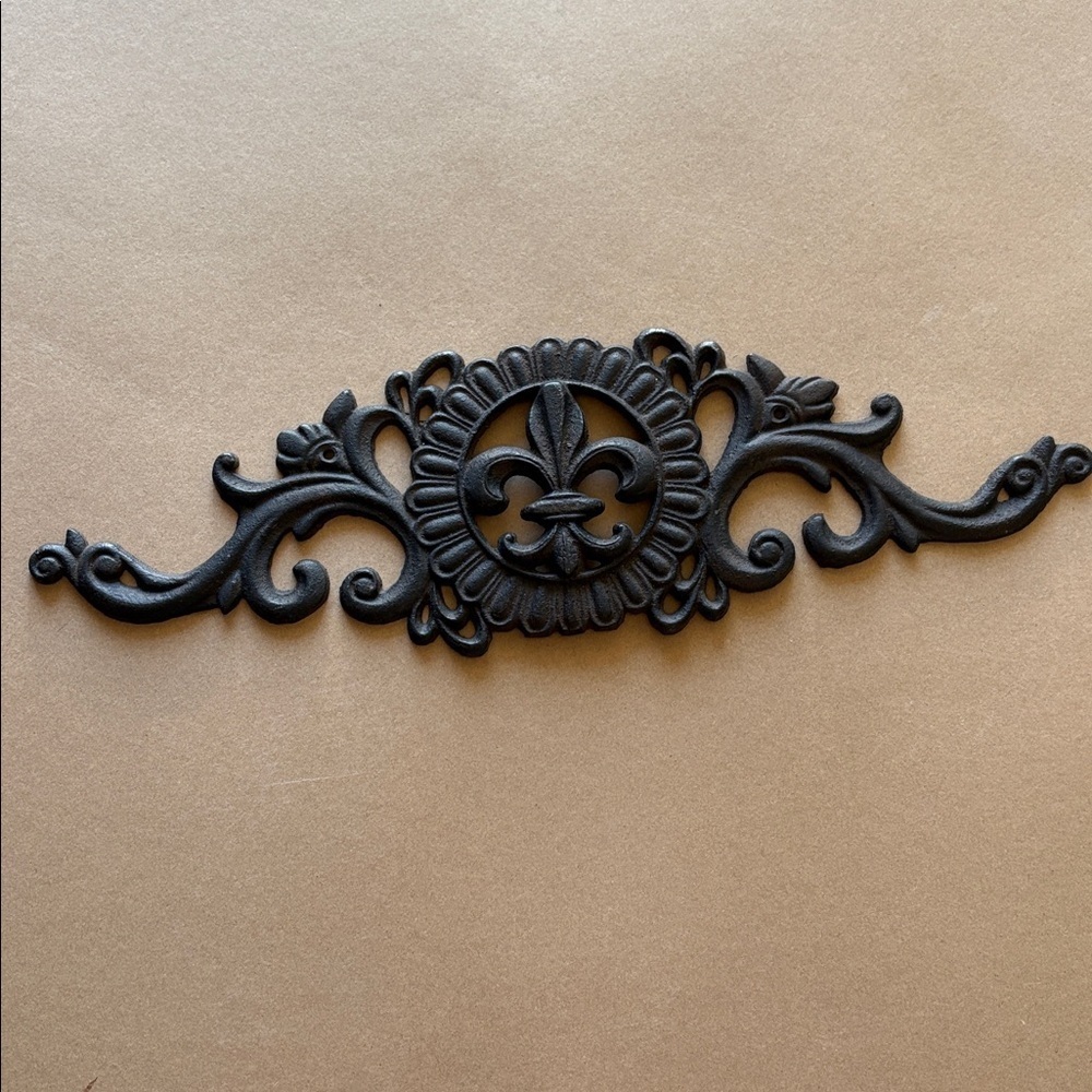 antique pediment iron